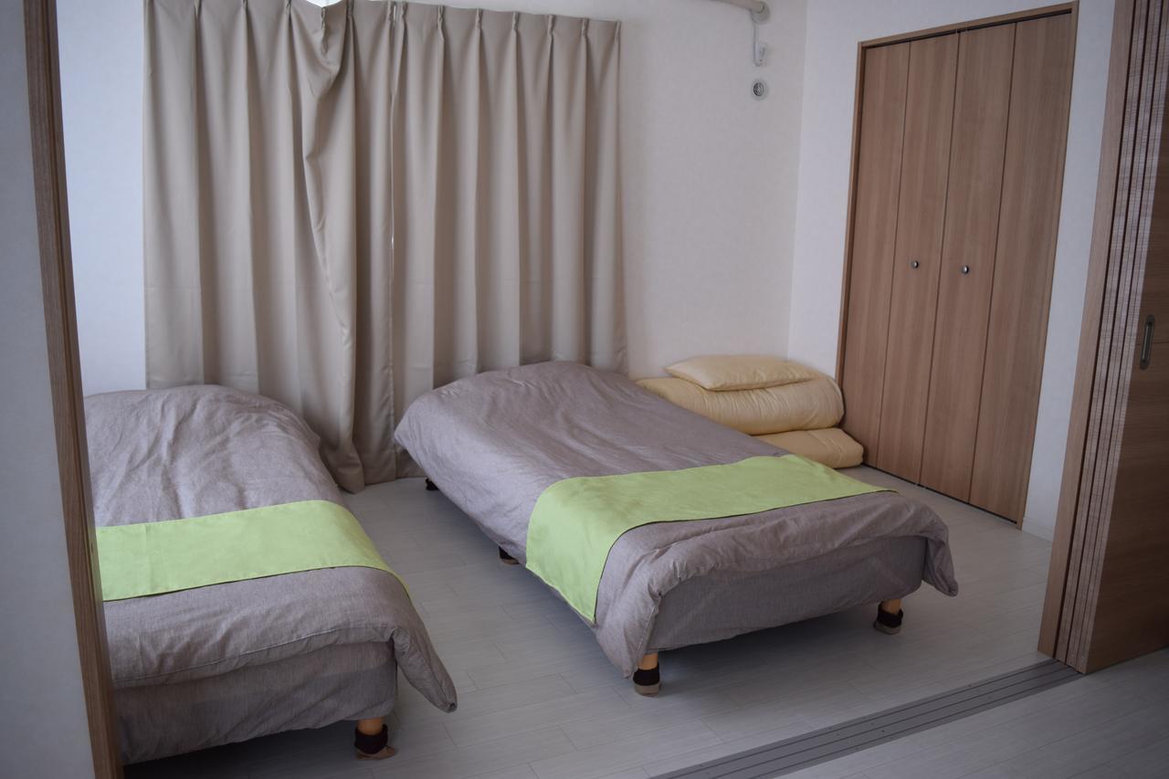 Ferienwohnung Rainbow Terrace Ginowan Exterior foto