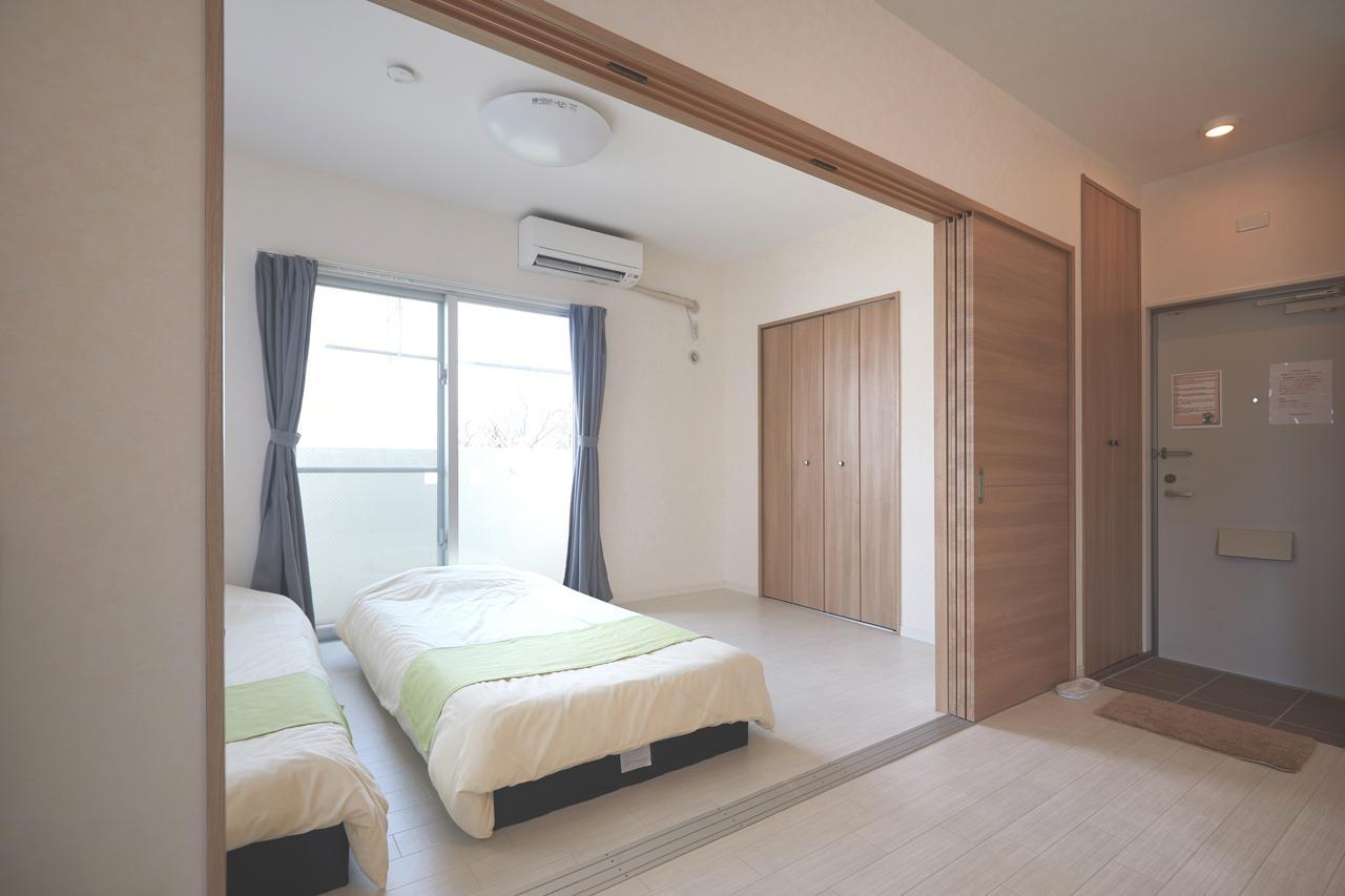 Ferienwohnung Rainbow Terrace Ginowan Exterior foto