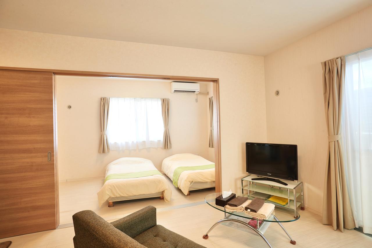 Ferienwohnung Rainbow Terrace Ginowan Exterior foto