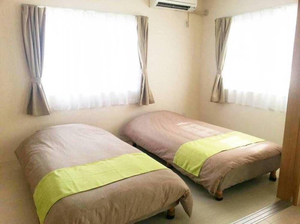 Ferienwohnung Rainbow Terrace Ginowan Exterior foto