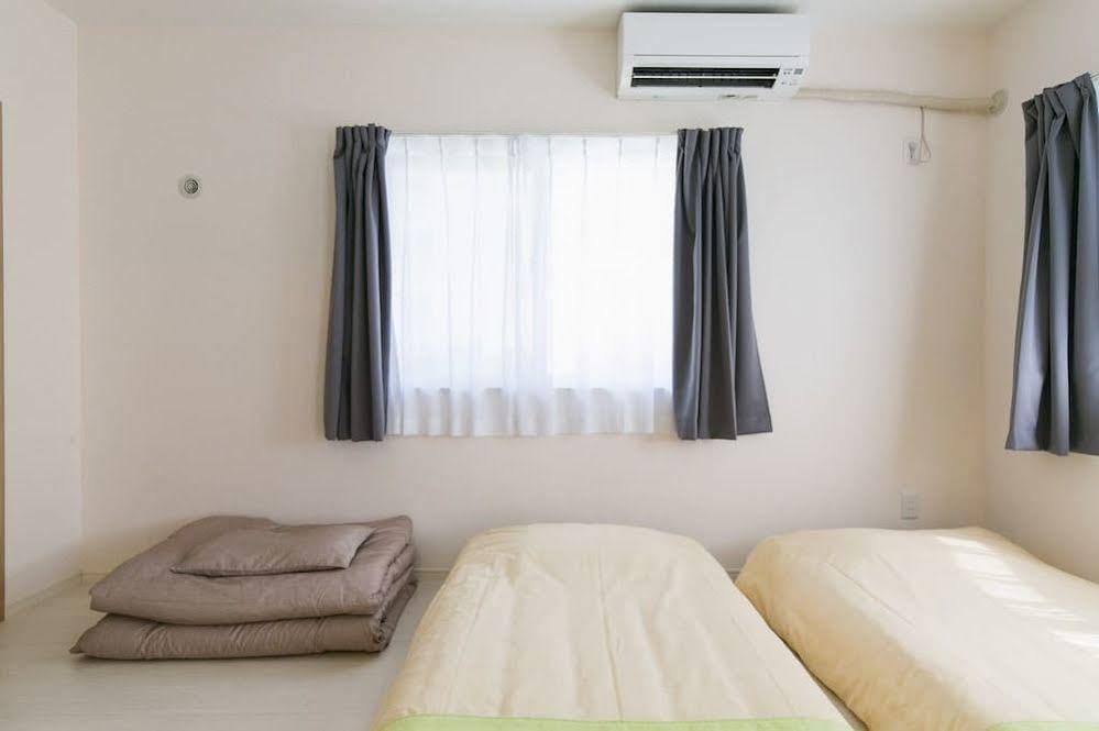 Ferienwohnung Rainbow Terrace Ginowan Exterior foto